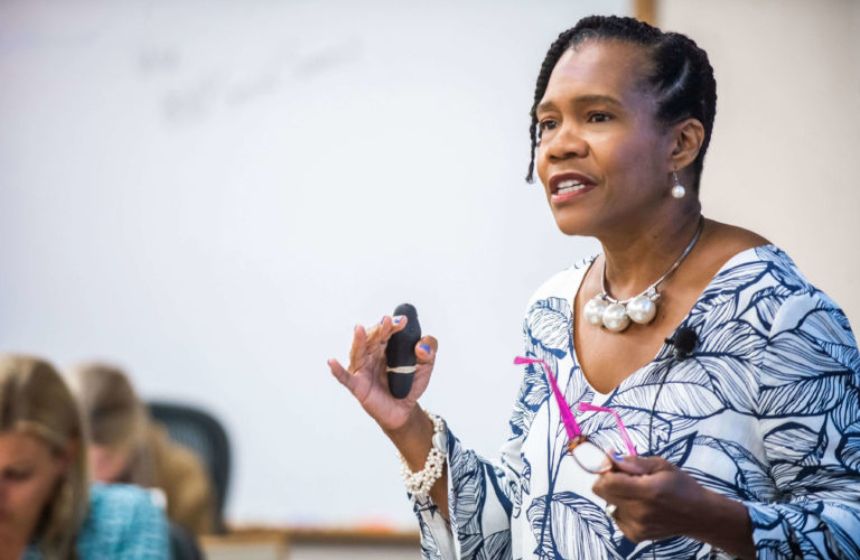 A woman public speaking.